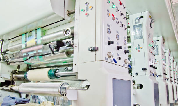 packaging Machine with white rolls and plastic film running